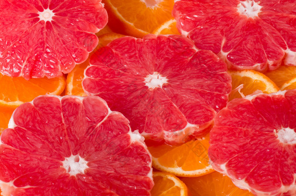与葡萄柚和橙色背景