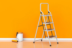 绘画的墙在橘黄色的概念。辊油漆罐