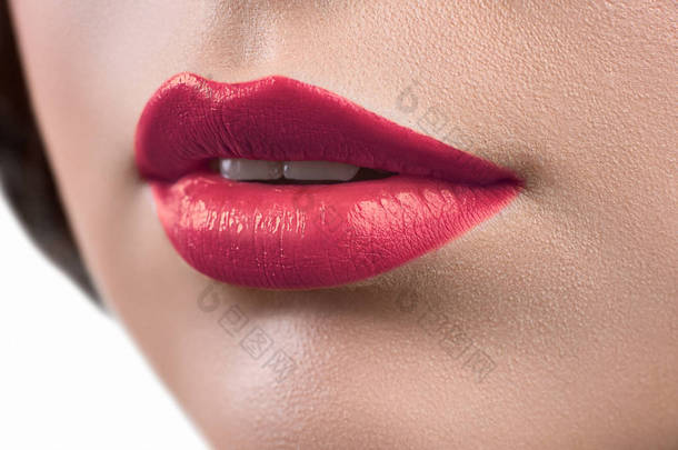 近摄镜头的一个女人穿着口红的嘴唇或唇 glo