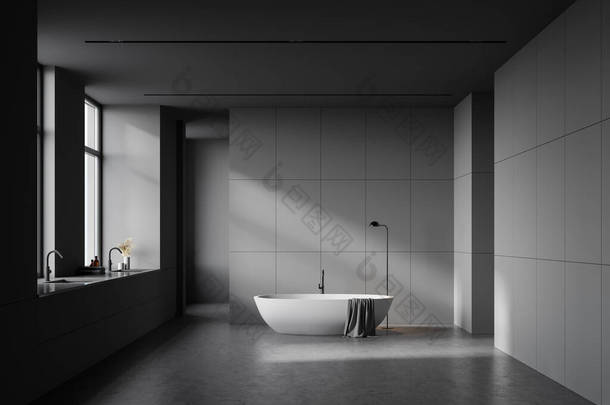 有灰色墙壁、混凝土地面、白色浴缸和靠近两扇窗户的双层水池的宽敞浴室的内部。3d渲染