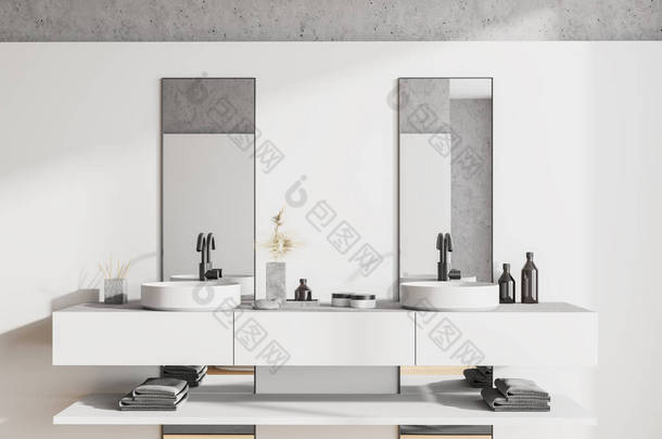在现代浴室的白色架子上，有两个垂直的镜子，配有白色和石墙，关闭圆形双层水池。3d渲染