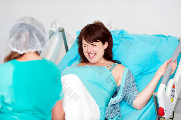 Pregnant woman in childbirth