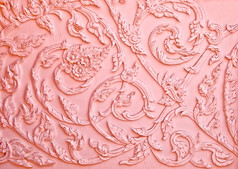 粉红色的灰泥设计的本机的泰式风格，在墙上