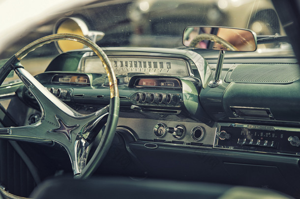 Sleza, Poland, August 15, 2015: Close up on old vintage car steering wheel and cockpit on  Motorclas