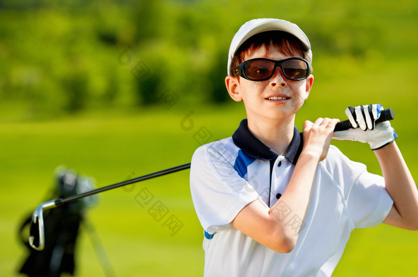男孩的高尔夫球手的肖像 