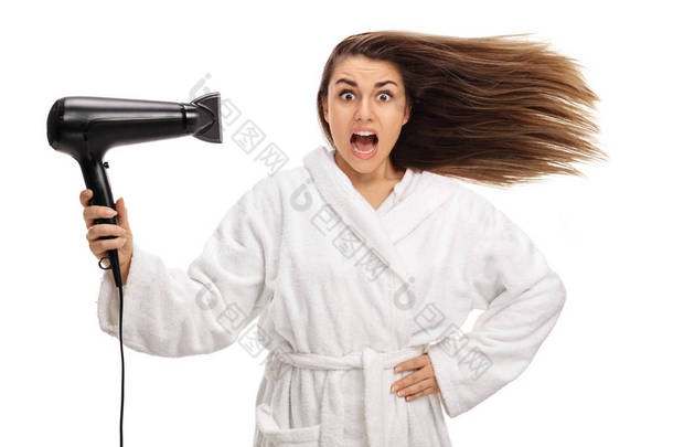 震惊<strong>干燥</strong>用吹风机将头发的女人
