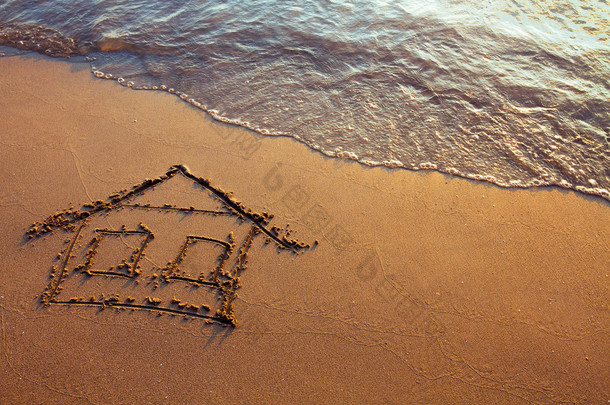 画在沙滩上的房子