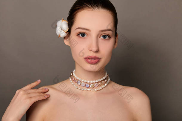 Beautiful healthy skin care woman closeup face time concept.