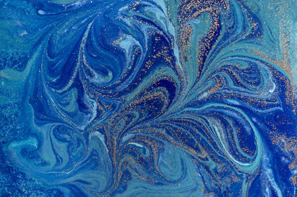 大理石与金色<strong>亮片</strong>蓝色抽象背景。液体的大理石墨迹模式.