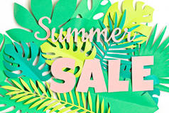 热带剪纸上的文字夏季销售背景.夏季销售、网上交易、折扣概念.