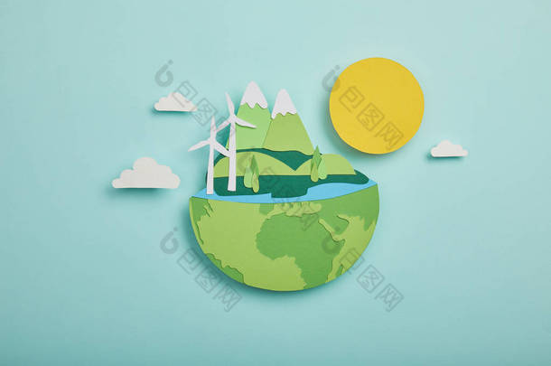 在绿松石背景下, 在地球<strong>日</strong>概念上, 用可再生能源切割行星的最高视图