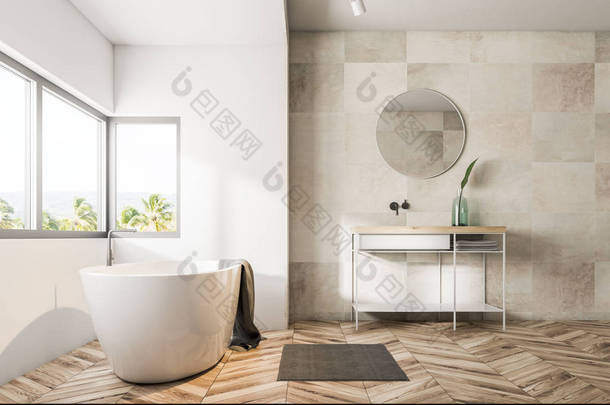 浴室内有<strong>米色</strong>瓷砖墙、木地板、大窗户下的浴缸、水槽和圆形镜子。3d 渲染