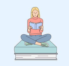 智力爱好、书迷、学生学习和准备考试纲要的概念.坐在书堆上看书的年轻人或学生.