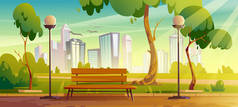 有木制长椅和绿树的城市公园