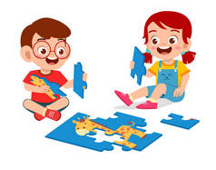 快乐可爱的小男孩和小女孩玩拼图游戏