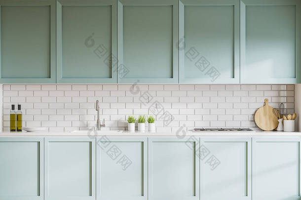 时尚厨房的内部，有白色的砖墙，蓝色的橱柜和台面，内置<strong>水槽</strong>和炊具。3d渲染