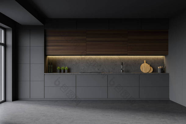 时尚厨房的内部，有灰色和石墙，灰色台面与内置炊具和沉淀池和黑暗的木制<strong>橱柜</strong>。3d渲染