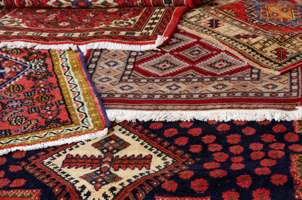 纹理和古代手工地毯和地毯的背景