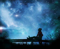 女孩看着夜空中的星星