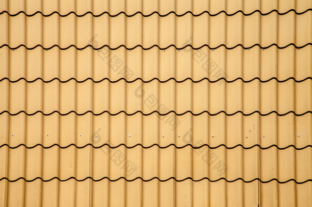 从一幢大厦的沙质屋顶瓷砖纹理