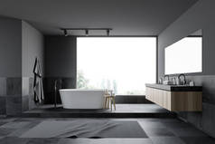 灰色和瓷砖浴室内部，浴缸和水槽