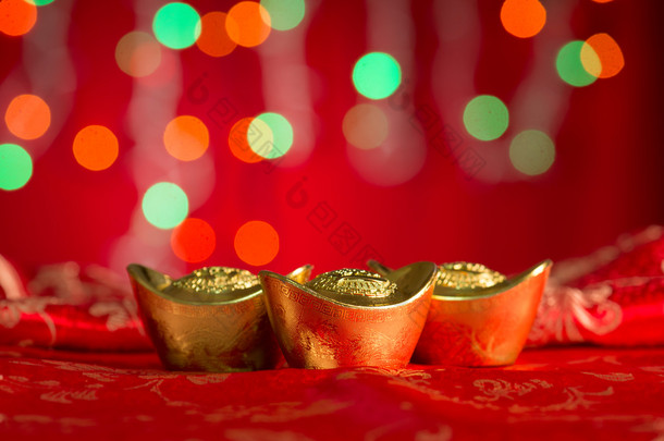 Chinese New Year decorations gold ingots with copy space