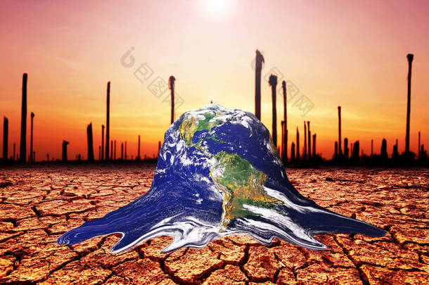 由于全球变暖，地球在干旱的土壤中融化。环境保护和减少全球变暖的概念
