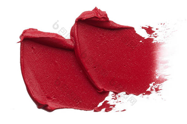 红色化妆涂片的哑光<strong>唇</strong>光泽隔离在白色背景。白色背景的红色奶油口红纹理隔离