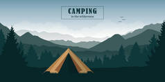 在绿色山景森林中的荒野帐篷中露营冒险
