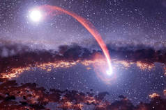 黑洞吸吮星星。 这张照片是由美国国家航空航天局提供的.