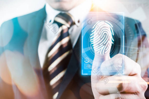 商人的抽象形象是用大拇指扫描覆盖在未来主义全息图上的.指纹、生物鉴别、信息技术和网络安全的概念.