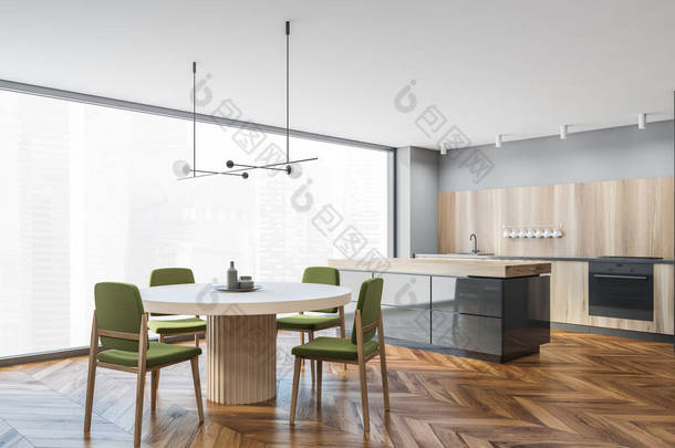 <strong>现代厨房</strong>的拐角处，有灰色的墙壁、木制的地板、木制的橱柜和有绿色椅子的餐桌。3d渲染