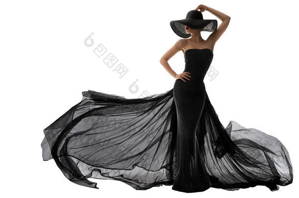 黑色女装时尚。《帽子中的优雅女士》模式轮廓在《长夜黑树苗在风中飘扬》。孤立的白色