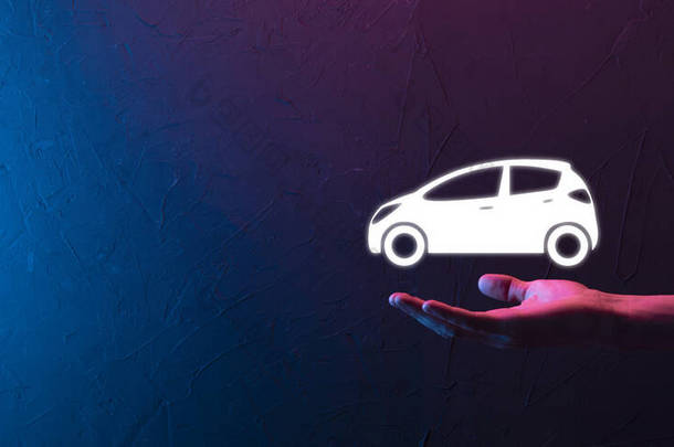 Male hand holding car auto icon on neon red blue background. Wide banner composition.Car automobile 