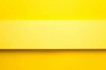黄色的纸横幅黄色的纸背景前视图复制空间平躺黄色的纸横幅黄色的纸背景