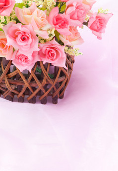 玫瑰木篮子织物粉红色的背景