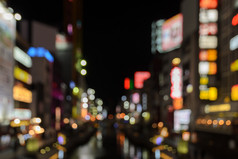 摘要模糊照亮广告牌商店和餐厅晚上大阪日本