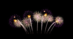 色彩斑斓的粉红色的烟花显示黑色的天空庆祝活动和周年纪念日概念
