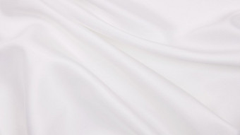 光滑的优雅的白色丝绸缎奢侈品<strong>布</strong>纹理可以使用<strong>婚礼</strong>背景豪华的背景设计