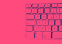 细节现代铝电脑键盘与白色键视图从以上粉红色的和紫色的双色版效果