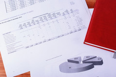 记事本和金融表的办公室表格日记和金融图表业务概念
