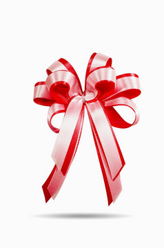 红色的和白色礼物丝带缎弓孤立的白色丝带缎弓