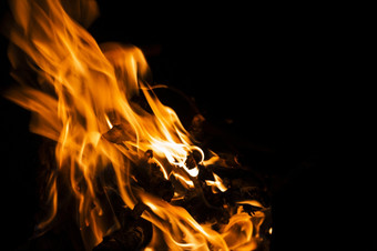 火火焰黑色的背景大火火火焰纹理背景关闭火火焰孤立的黑色的背景燃烧摘要火火焰背景纹理