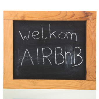 荷兰欢迎回家Airbnb写黑板上孤立的在白色背景