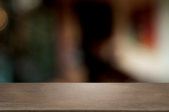 木桌面前面蒙太奇模糊餐厅咖啡馆厨房背景