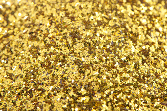 背景黄金闪光糖果闪亮的黄金纹理使用的设计为的新一年圣诞节生日背景黄金闪光糖果闪亮的黄金纹理