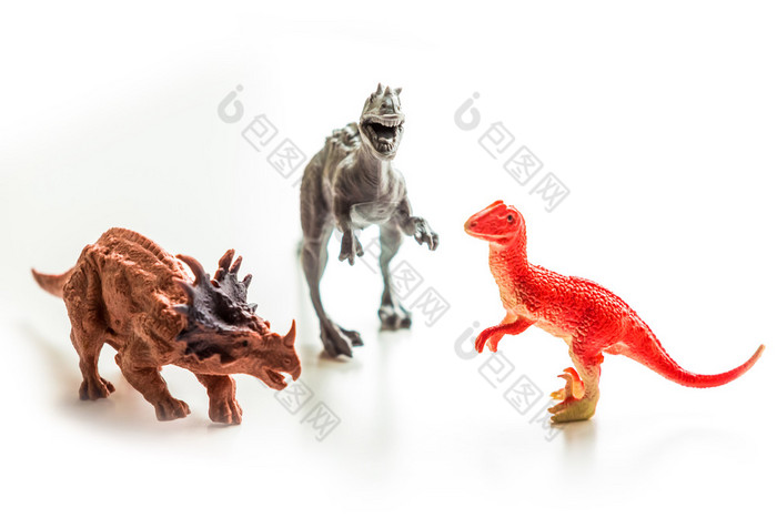 恐龙玩具白色孤立的背景小大小的恐龙玩具白色孤立的背景