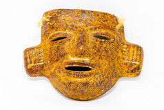 传统的阿兹特克陶瓷脸面具装饰孤立的传统的阿兹特克陶瓷脸面具装饰