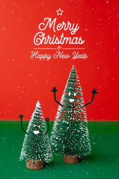 快乐圣诞节和快乐新一年类型与圣诞节树与微笑脸情感涂鸦风格装饰绿色表格与生动的红色的和下雪backgroundholiday庆祝活动问候卡