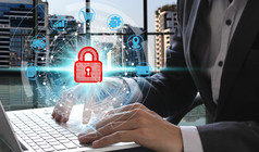 手使用移动PC电脑与挂锁图标技术网络安全数据保护业务技术隐私概念